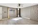 Bedroom with wood-look floors and an accent wall at 1045 N Granite Reef Rd, Scottsdale, AZ 85257