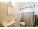 Clean bathroom with white vanity and updated shower at 2047 W Maryland Ave, Phoenix, AZ 85015