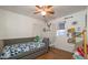 Cozy bedroom with daybed and built-in shelving at 2047 W Maryland Ave, Phoenix, AZ 85015