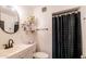 Clean bathroom with a shower/tub combo at 2047 W Maryland Ave, Phoenix, AZ 85015