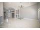 Open living area with tile flooring and a ceiling fan at 7469 W Monona Dr, Glendale, AZ 85308