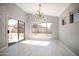 Breakfast nook with backyard access and large windows at 7469 W Monona Dr, Glendale, AZ 85308