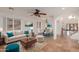 Bright living room with tiled floor, comfy furniture and high ceilings at 944 S Grand --, Mesa, AZ 85210