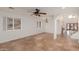 Open living area with tiled floors and a neutral color scheme at 944 S Grand --, Mesa, AZ 85210