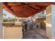 Outdoor kitchen with stainless steel grill and granite countertops at 944 S Grand --, Mesa, AZ 85210
