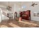 Spacious kitchen with dark wood cabinets and granite island at 944 S Grand --, Mesa, AZ 85210
