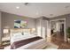 Spacious main bedroom with plush bedding and ample natural light at 944 S Grand --, Mesa, AZ 85210