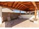 Covered patio with built-in bar and seating area, perfect for outdoor entertaining at 944 S Grand --, Mesa, AZ 85210