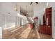 Spacious living room with high ceilings and a large chandelier at 944 S Grand --, Mesa, AZ 85210