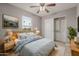 Charming bedroom with light blue bedding and wood flooring at 944 S Grand --, Mesa, AZ 85210