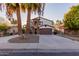 Two story house with a large driveway and landscaping at 944 S Grand --, Mesa, AZ 85210