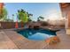 Inviting pool with a rock waterfall and slide feature at 944 S Grand --, Mesa, AZ 85210