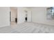 Bright bedroom with plush carpeting and access to en-suite bathroom at 21048 E Arroyo Verde Dr, Queen Creek, AZ 85142