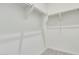 Bright walk-in closet with double hanging rods and shelving at 21048 E Arroyo Verde Dr, Queen Creek, AZ 85142