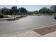 Asphalt parking lot in a residential community at 21048 E Arroyo Verde Dr, Queen Creek, AZ 85142