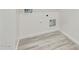 Convenient laundry area with tile flooring and utility hookups at 21048 E Arroyo Verde Dr, Queen Creek, AZ 85142