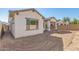 New construction home with backyard and unfinished landscaping at 21048 E Arroyo Verde Dr, Queen Creek, AZ 85142