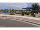 Community playground with a shaded seating area at 21048 E Arroyo Verde Dr, Queen Creek, AZ 85142