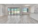 Open living area featuring sliding glass doors and tile flooring at 21048 E Arroyo Verde Dr, Queen Creek, AZ 85142