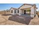New construction home with covered patio and unfinished landscaping at 21048 E Arroyo Verde Dr, Queen Creek, AZ 85142