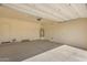 Attached garage with automatic door opener and water heater at 21048 E Arroyo Verde Dr, Queen Creek, AZ 85142