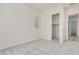 Simple bedroom with carpet, window, and closet at 21048 E Arroyo Verde Dr, Queen Creek, AZ 85142