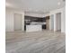 Open concept kitchen with island and dark cabinetry at 21048 E Arroyo Verde Dr, Queen Creek, AZ 85142