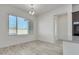 Dining room with wood-look tile floors and a window at 21048 E Arroyo Verde Dr, Queen Creek, AZ 85142