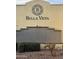 Bella Vista community entrance with ornate signage and tile accents at 12956 W El Sueno Ct, Sun City West, AZ 85375