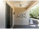 Covered patio with ceiling fan and grill at 12956 W El Sueno Ct, Sun City West, AZ 85375