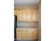 Upper kitchen cabinets with ample storage space at 12956 W El Sueno Ct, Sun City West, AZ 85375