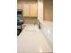Clean kitchen sink with a modern faucet and light countertops at 12956 W El Sueno Ct, Sun City West, AZ 85375