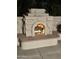 Close-up view of an outdoor fireplace at 12956 W El Sueno Ct, Sun City West, AZ 85375
