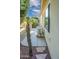 Landscaped side yard with covered grill at 12956 W El Sueno Ct, Sun City West, AZ 85375