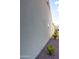 Side of house with stucco siding and small window at 12956 W El Sueno Ct, Sun City West, AZ 85375