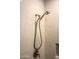 Close-up of a shower with modern fixtures and hexagonal tile floor at 12956 W El Sueno Ct, Sun City West, AZ 85375