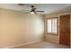 Spare bedroom with ceiling fan and tiled floor at 12956 W El Sueno Ct, Sun City West, AZ 85375