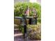 Dual mailboxes with an American flag, situated in front of a home at 12956 W El Sueno Ct, Sun City West, AZ 85375