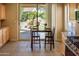 Kitchen with sliding door access to the backyard patio at 12956 W El Sueno Ct, Sun City West, AZ 85375