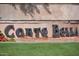 Corts Bella community entrance sign, welcoming residents and guests at 12956 W El Sueno Ct, Sun City West, AZ 85375