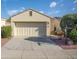 Single-story home with attached garage and landscaping at 12956 W El Sueno Ct, Sun City West, AZ 85375