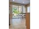 Kitchen with sliding door access to the backyard patio at 12956 W El Sueno Ct, Sun City West, AZ 85375