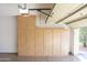 Garage with overhead storage and work bench at 12956 W El Sueno Ct, Sun City West, AZ 85375