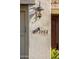 House number 12956 on a tile at 12956 W El Sueno Ct, Sun City West, AZ 85375
