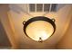 Image of an elegant, softly lit ceiling light fixture at 12956 W El Sueno Ct, Sun City West, AZ 85375