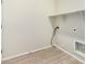 Laundry room with tile flooring and shelving at 10722 W Jefferson St, Avondale, AZ 85323