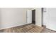 Bedroom with wood-look floors and closet at 10722 W Jefferson St, Avondale, AZ 85323