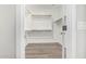Large walk-in closet with double hanging rods at 10722 W Jefferson St, Avondale, AZ 85323