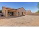 Backyard with gravel and a covered patio at 10722 W Jefferson St, Avondale, AZ 85323