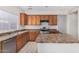 Kitchen with an island and stainless steel appliances at 10722 W Jefferson St, Avondale, AZ 85323